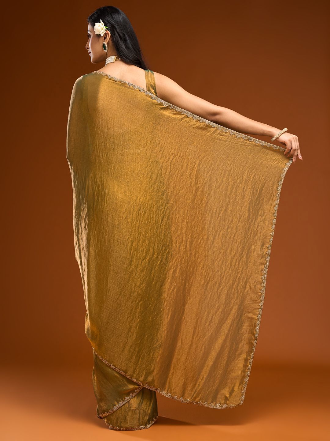 golden mustard satin silk saree, modern party wear, elegant cocktail look, minimalist festive draping style