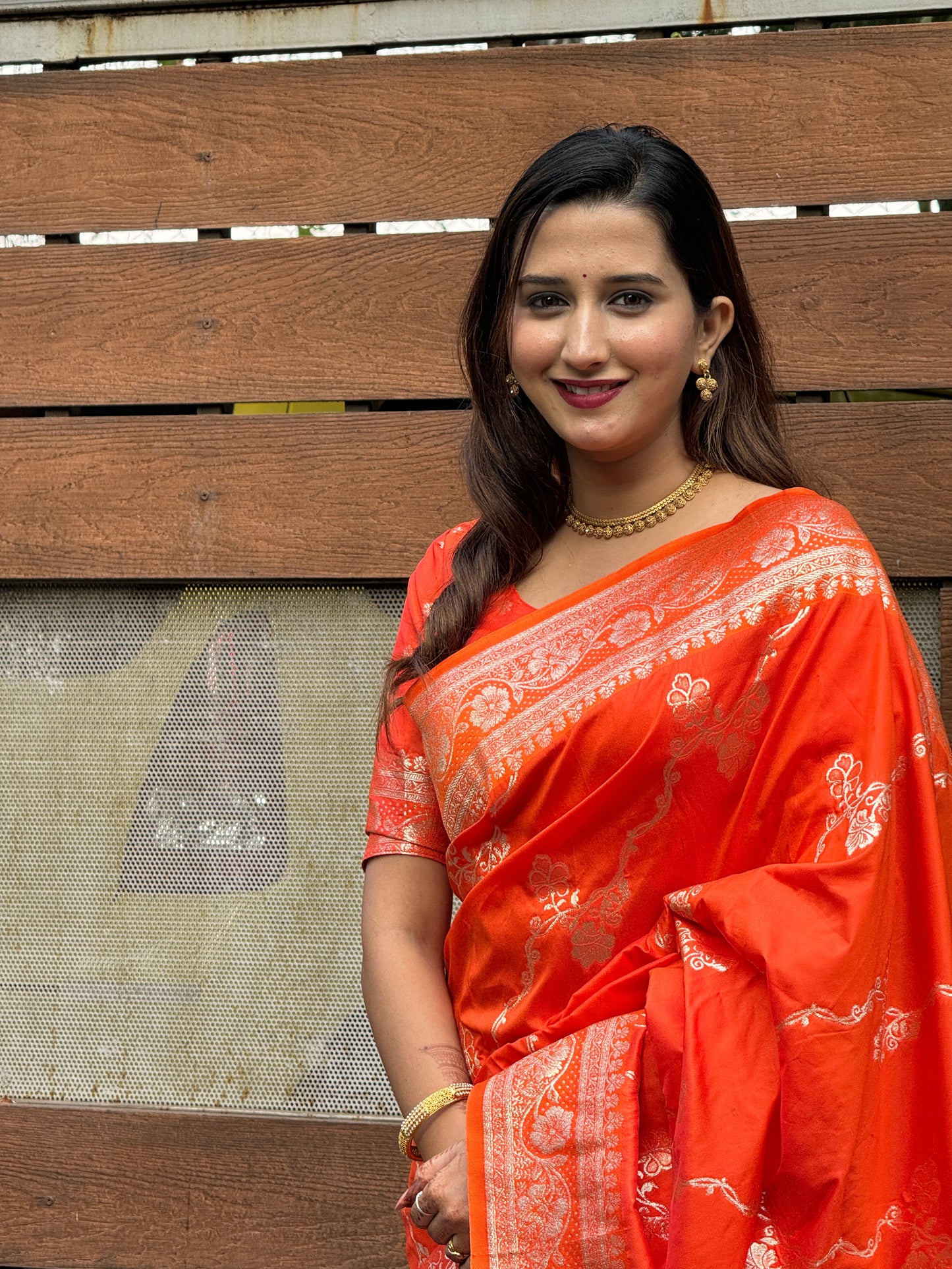 orange banarasi jaal soft silk zari woven saree