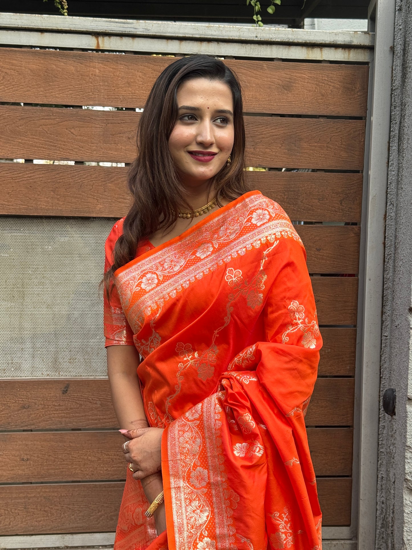 orange banarasi jaal soft silk zari woven saree