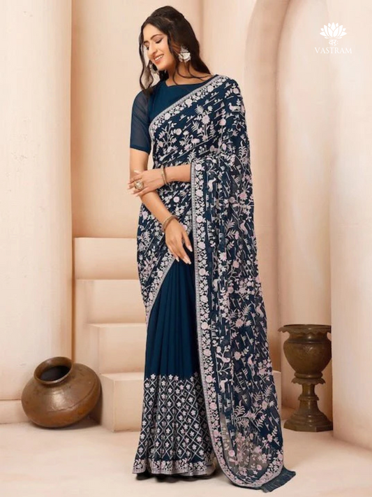 Teal & White Floral Embroidered Sequinned Poly Georgette Saree