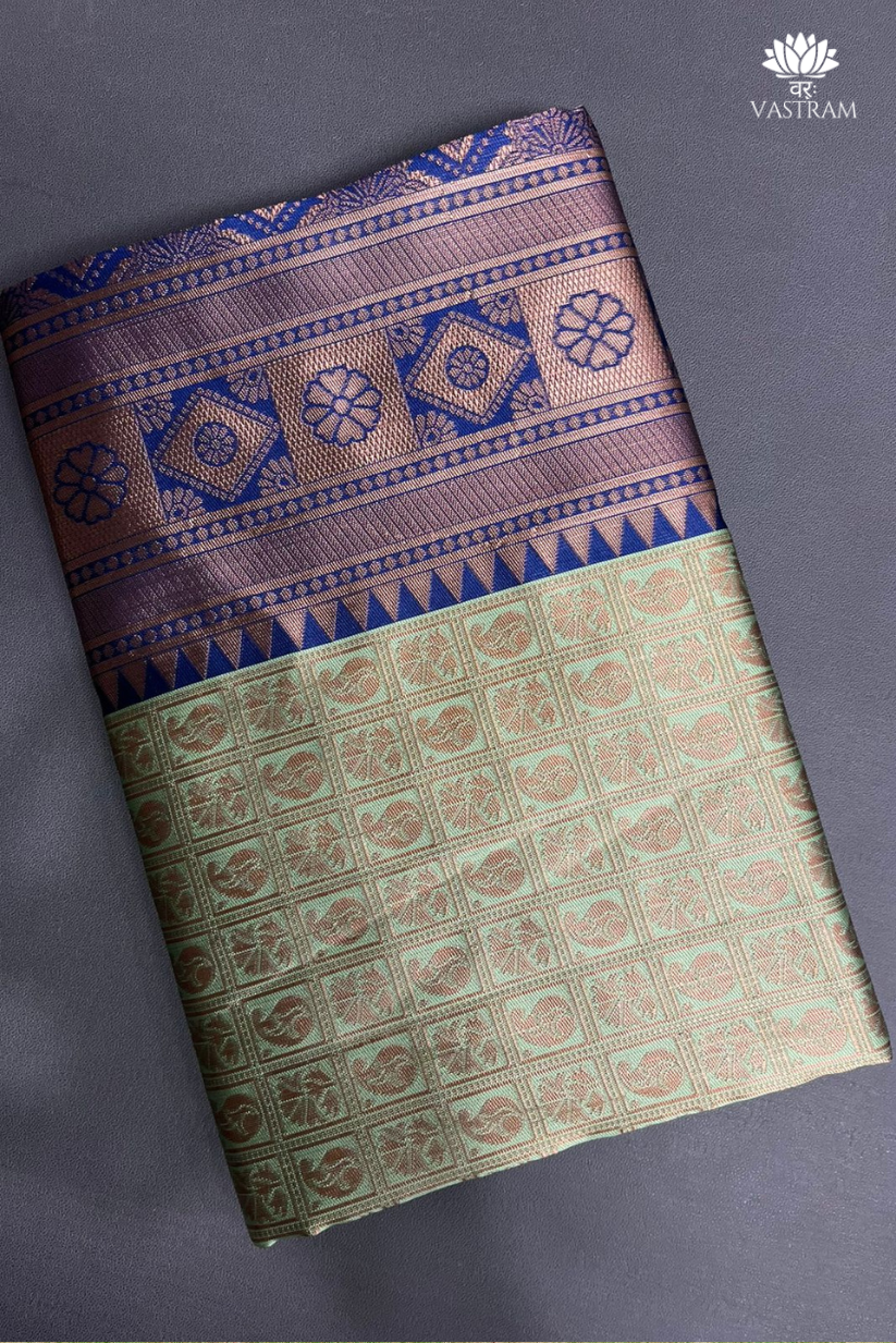 banarasi silk saree with royal blue and soft mint zari details perfect for weddings & festive celebrations