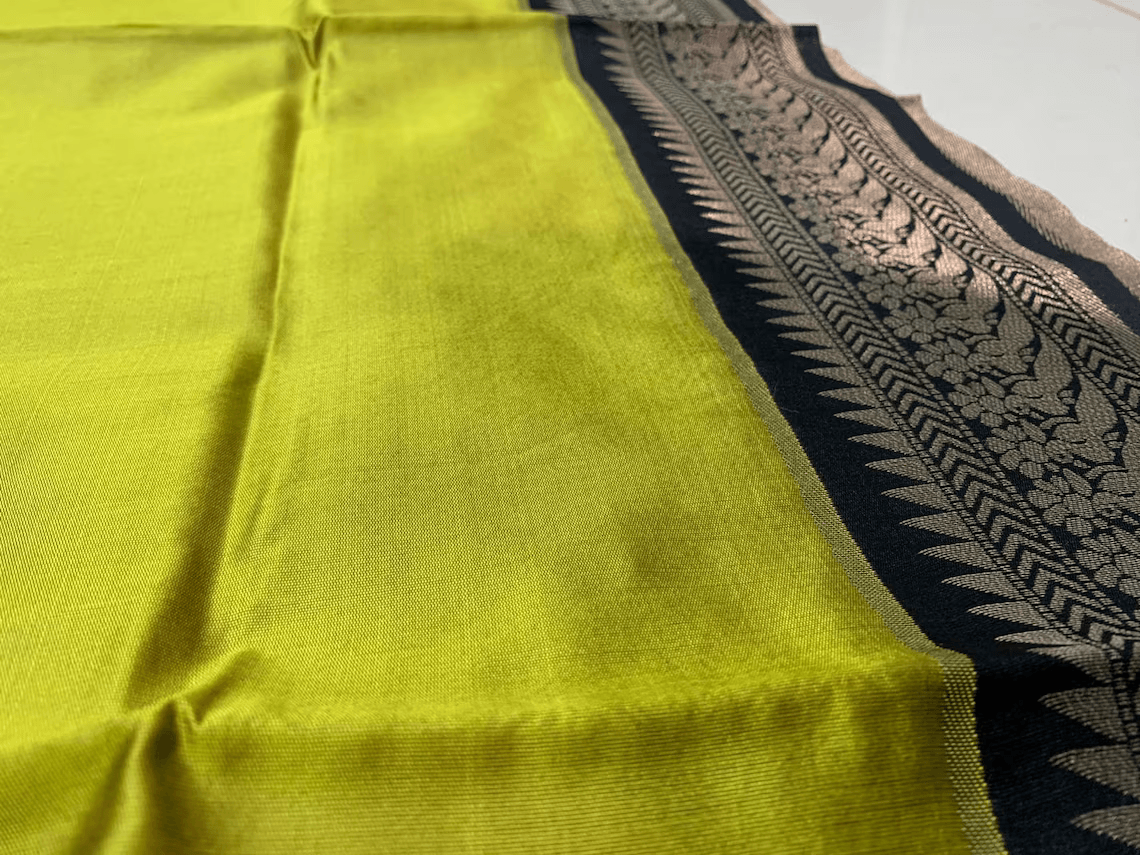 south indian silk saree in methi yellow for weddings | golden spice elegance | designer black blouse stitching | top pick - vara vastram