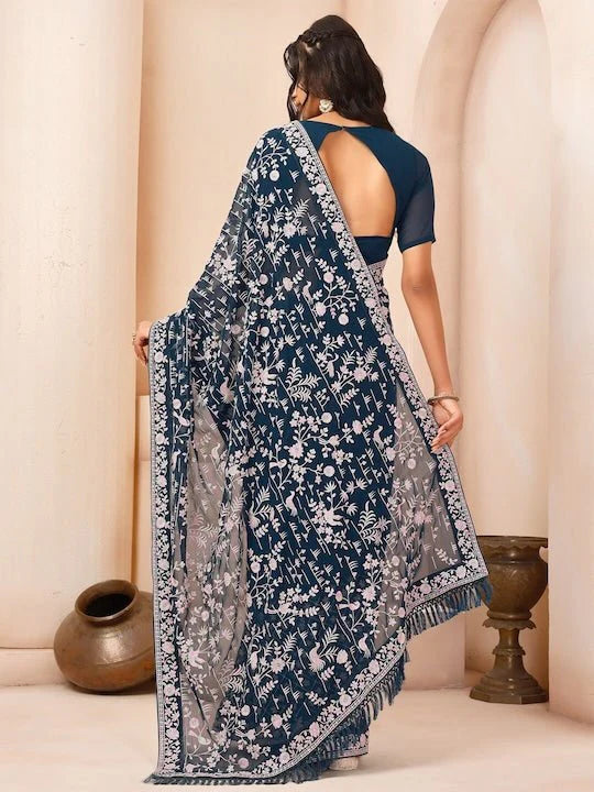 teal & white floral embroidered sequinned poly georgette saree