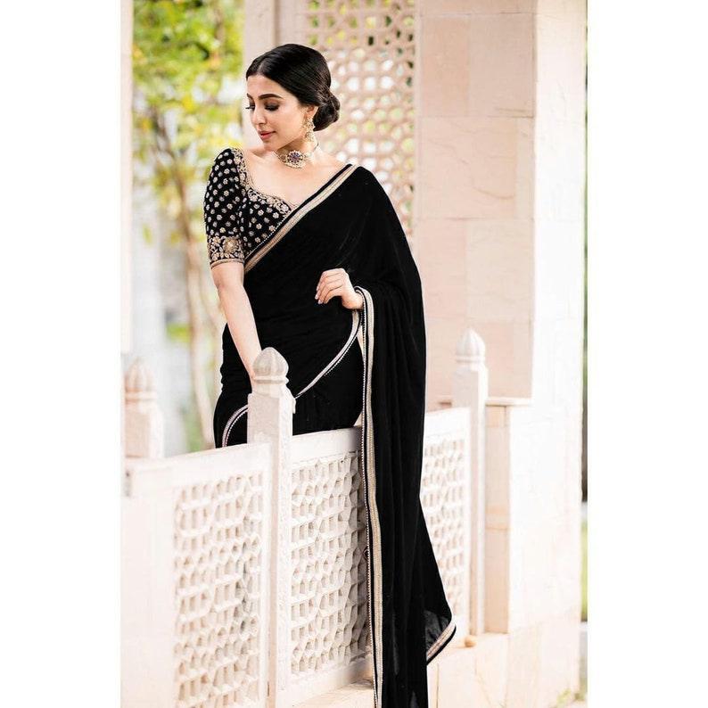 Buy light in weight and soft on the skin for comfort in summers designer banarasi  Black colour silk saree at wholesale rate from fab funda surat
